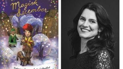 Katarina Genar bredvid sin bok Magisk december